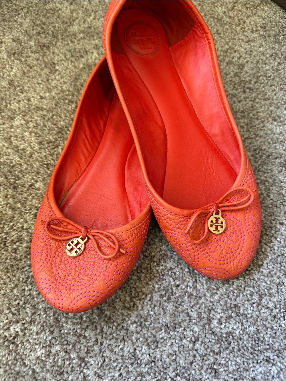 Tory Burch Coral-Orange Quilted Leather Ballet Flats with Logo Charm